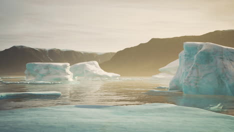 Antarctic-iceberg-landscape-with-glacier-running-into-ocean
